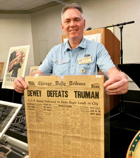 a person holding a newspaper
